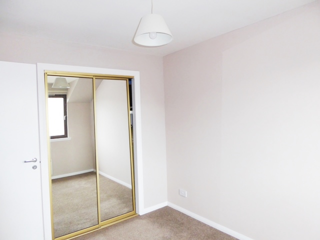 bedroom with fitted wardrobe 